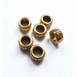 Cuenta metal 4 x 7 mm oro...